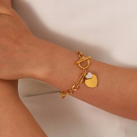 T-Bar Pavé Hearts Chain Bracelet in 18K gold plating, detail view of heart charms